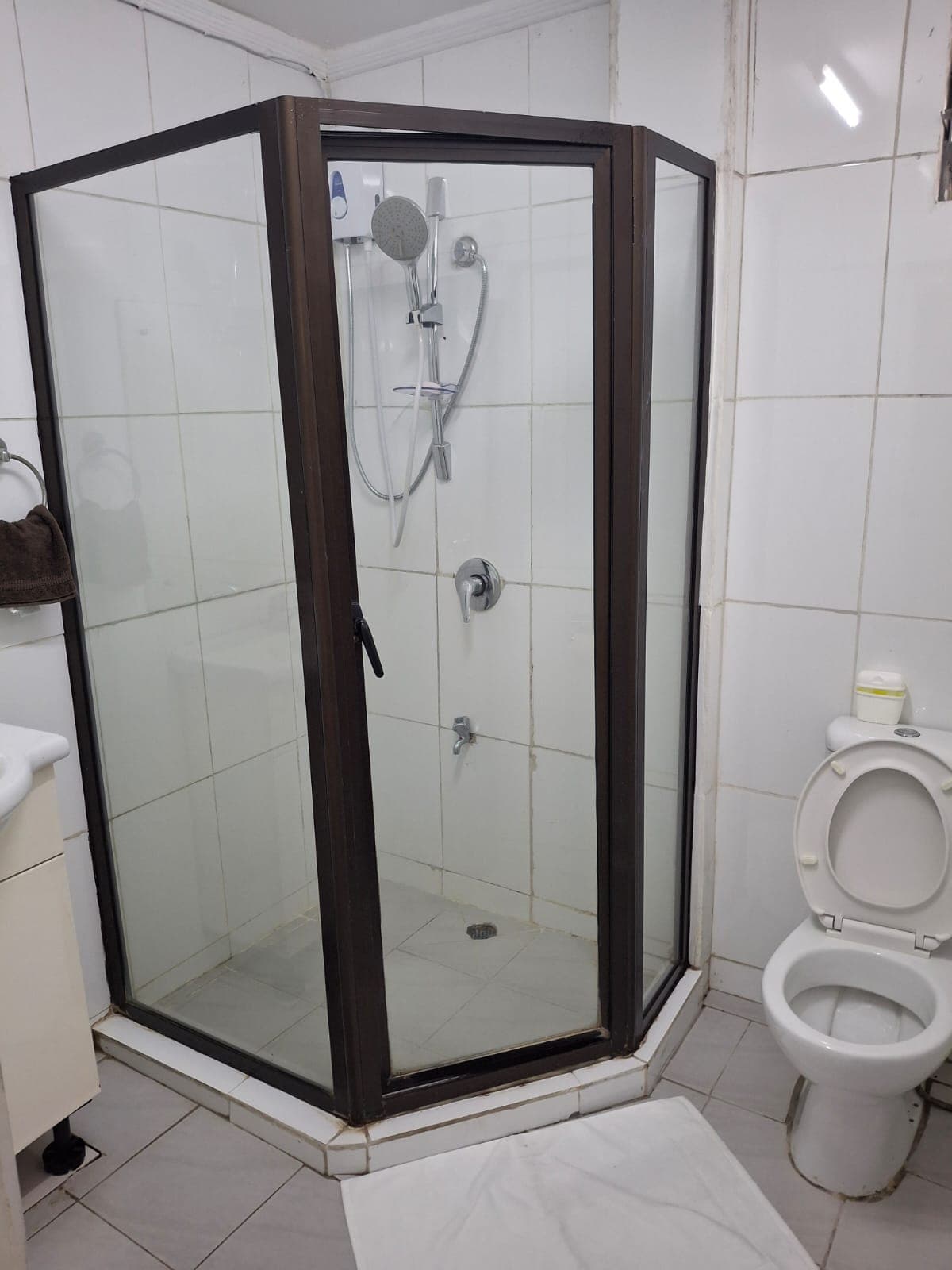 Bathroom with glass walk-in shower