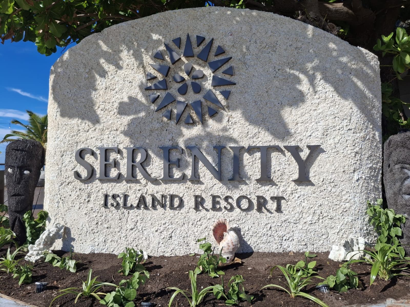 The Serenity Island Resort sign